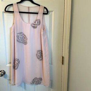 Chiffon dress with silver flowers.